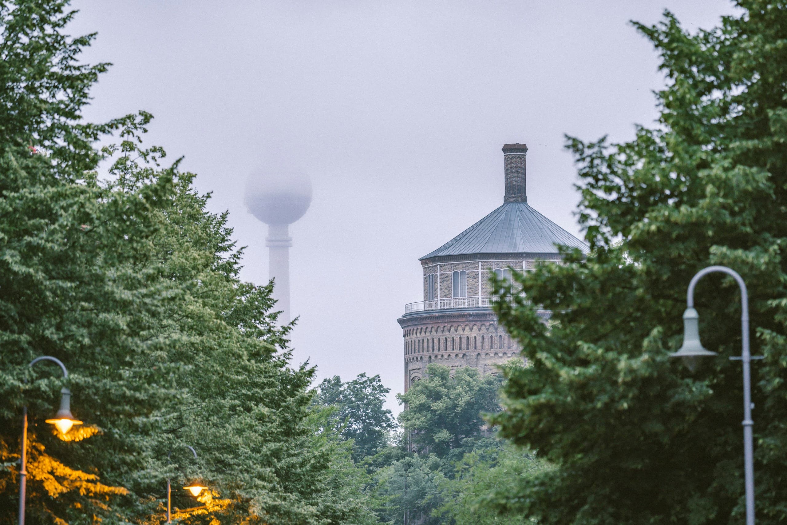 The Wasserturm in Prenzlauer Berg seen through summer trees